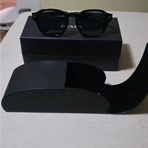 Prada PR A16SF - Black Sunglasses with Polarized Blue Lense